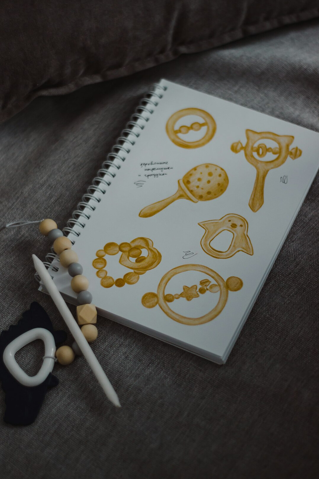 Detective notebook with magnifying glass and old map on a wooden desk