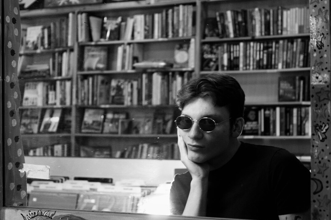 Portrait of a man writer with glasses
