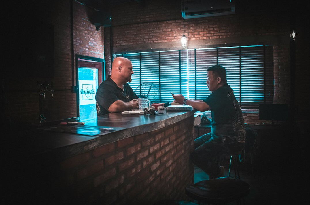 detective interviewing suspect