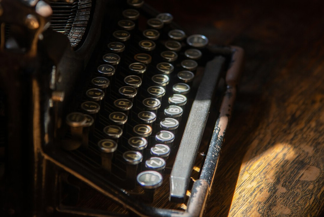 Vintage typewriter on a wooden desk